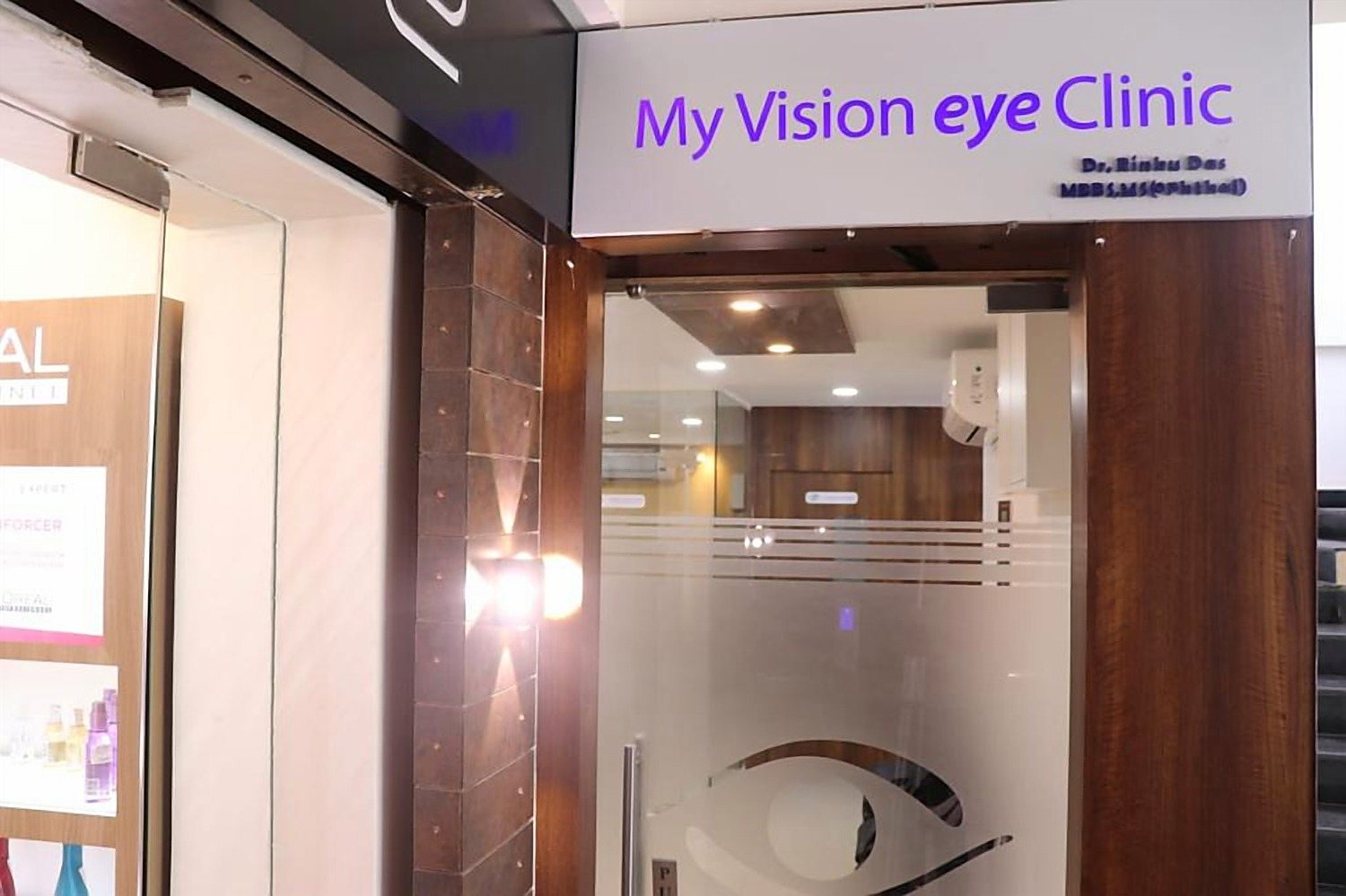 The clinic entrance on the first floor, with the My Vision eye Clinic sign above the stairs