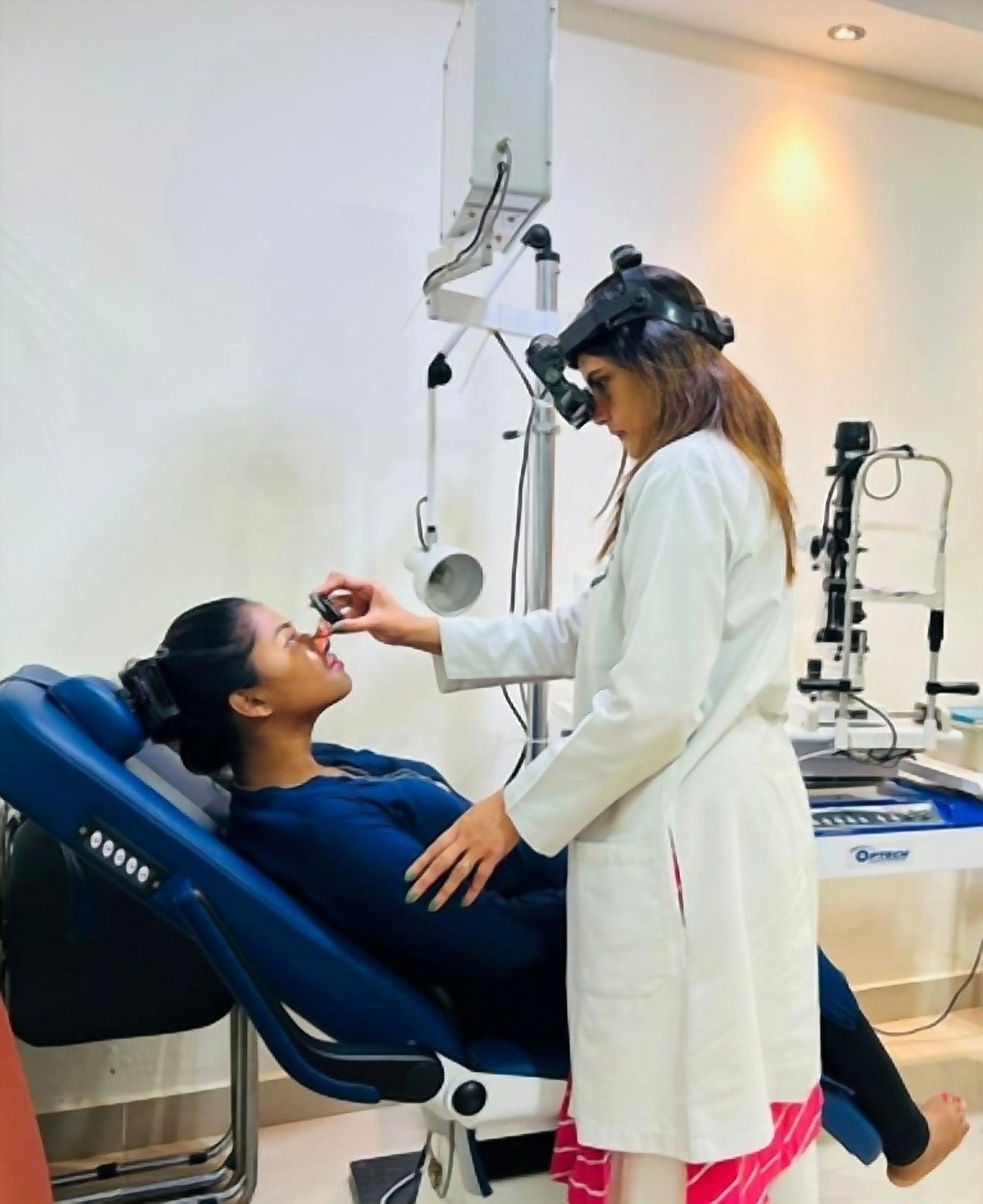 Dr. Rinku Das carrying out an indirect ophthalmoscopy examination